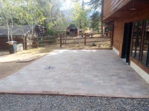 SR Custom Stone Masons replaced the flagstone patio with sharp looking Borgert Pavers.