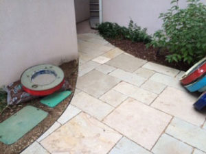 Final touch: A curve sidewalk to the back door of this Boulder home made with Stone Universe Paver Ashlar.