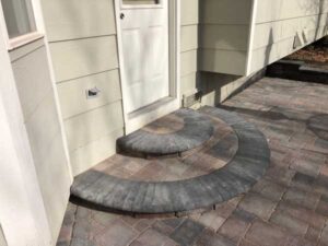 These circular steps are made with Bogert pavers and create a great accent for the back entryway.