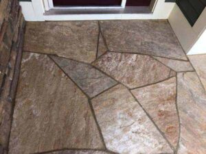 An interesting stone mosaic makes this Colorado Buff overlay special