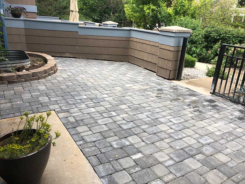 Grey pavers created an easily maintained exterior in this Lafayette, CO, home